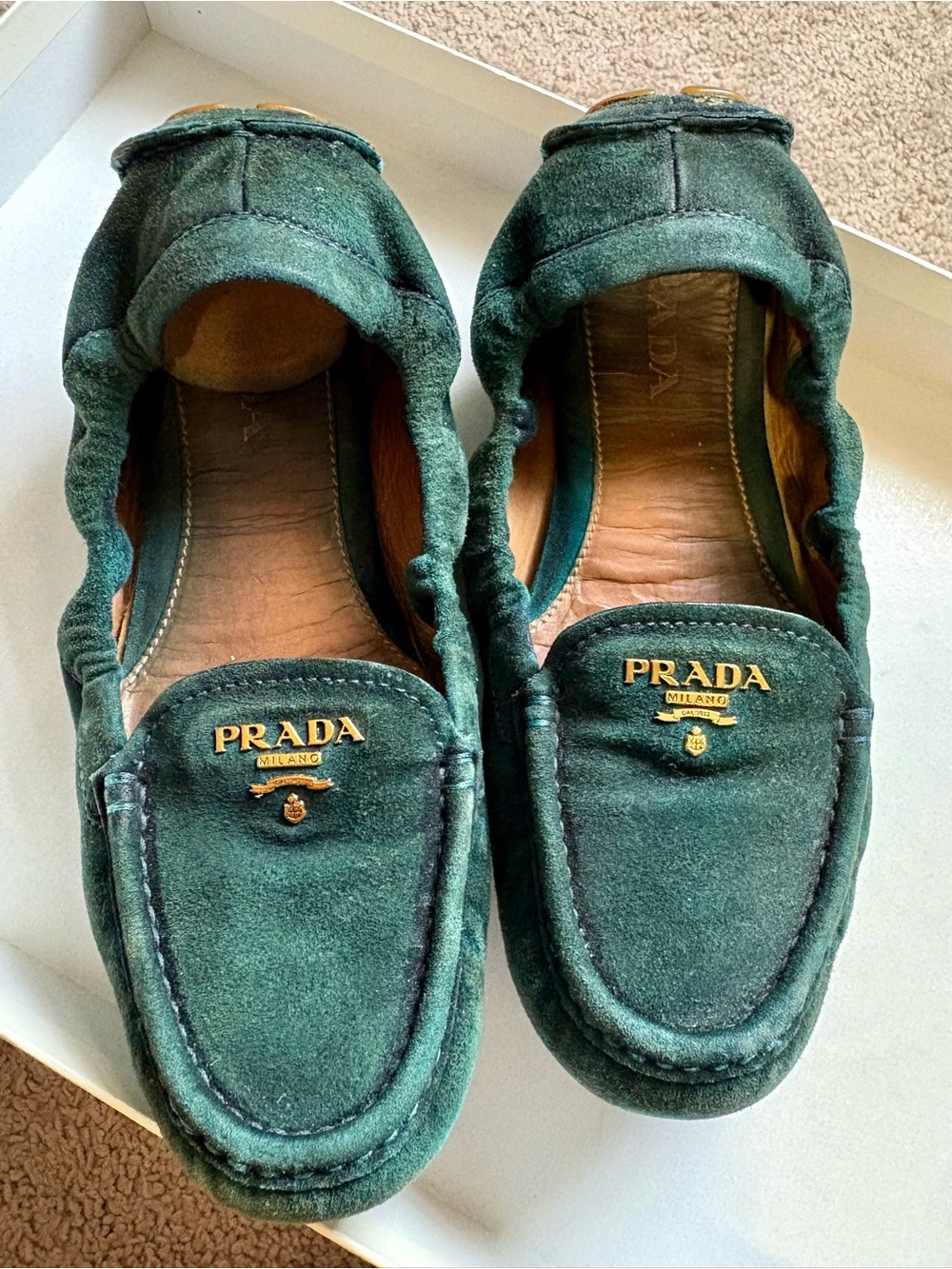 Prada Suede Loafers with Gold Logo